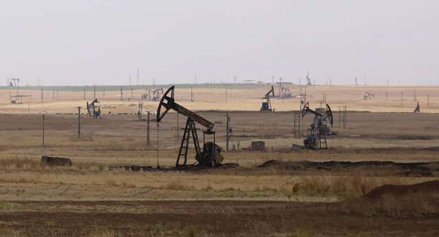 أمريكا تساعد «داعش» من أجل الحصول على البترول السوري