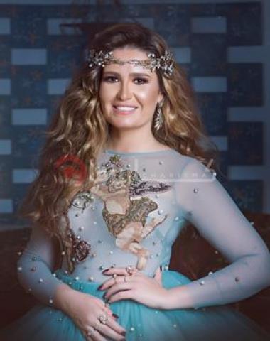 هنا شيحا في جلسه تصوير بفستان بالأميرات